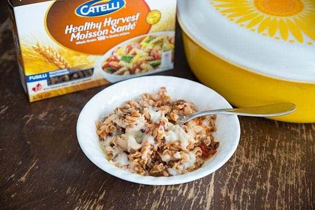 Macaroni Chop Suey in a White Bowl, Box of Catelli Macaroni and large yellow casserole dish at the back