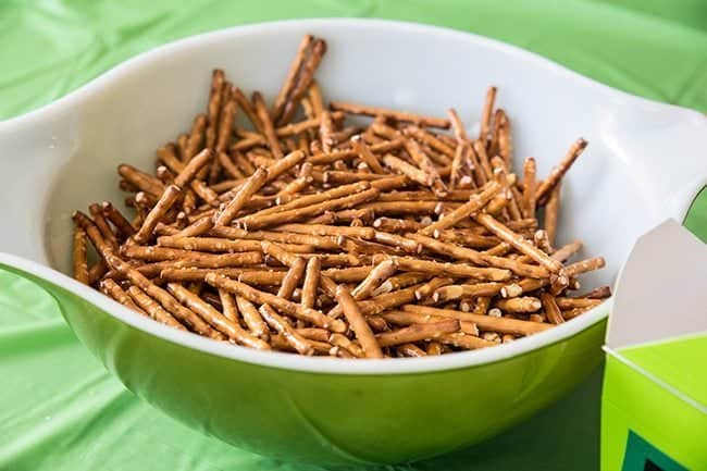 Pretzels for the Minecraft sticks in a green Pyrex bowl