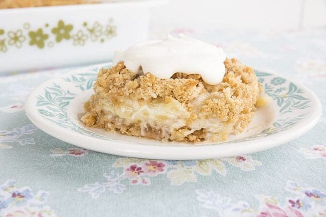 Pineapple Soda Cracker Dessert served with dollop of whipped cream on top