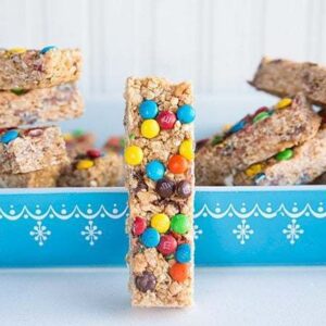 Close up of Homemade Granola Bar Slice with Colorful M&M's