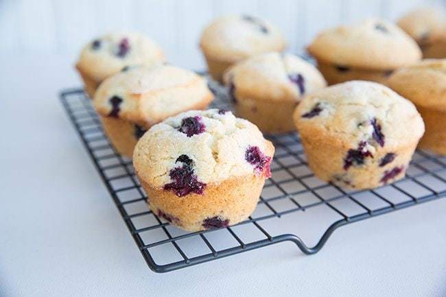 Bakery Style Blueberry Muffins in cooling rack