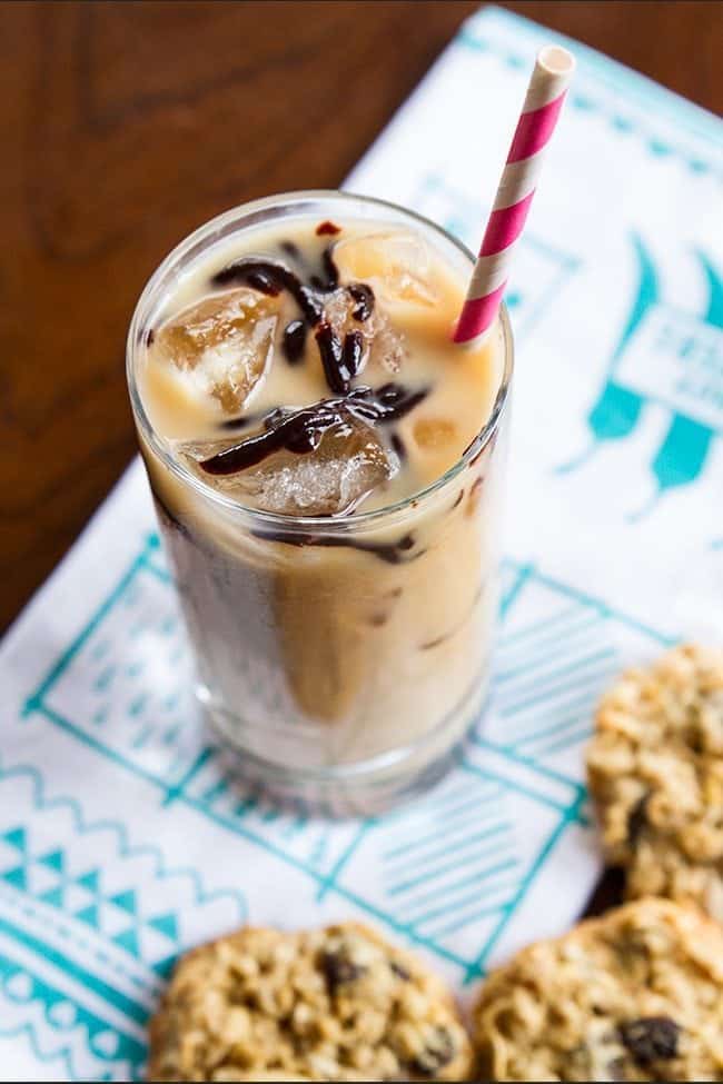 Top down shot of Boozy Bourbon Black Cow Drink with Chocolate Sauce on Top