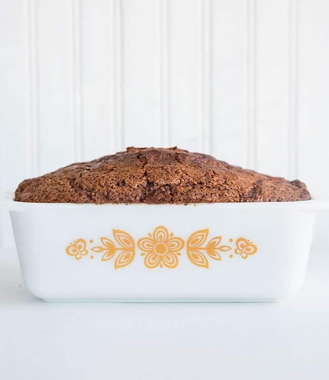Cinnamon Swirl Loaf in a White Pyrex loaf pan with Floral print