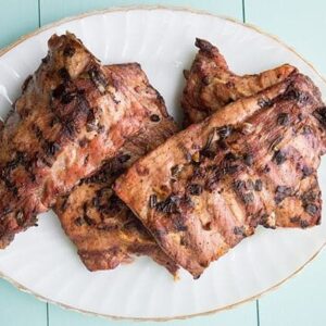 Salt and Pepper Ribs in a white oval plate