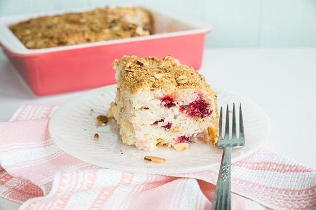  Strawberry Plum Crumble Cake in a dessert plate and in a pink baking dish