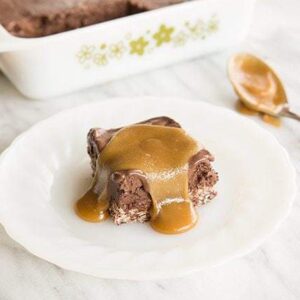 Chocolate Truffle Squares with caramel sauce in a white plate and in a baking pan