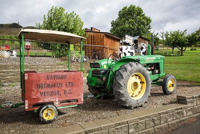 tractors with little carts behind it