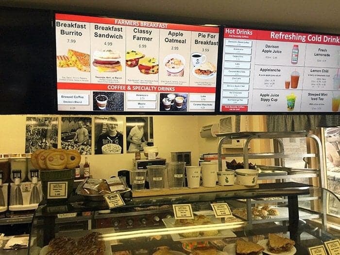 the inside of house cafe showing their menu