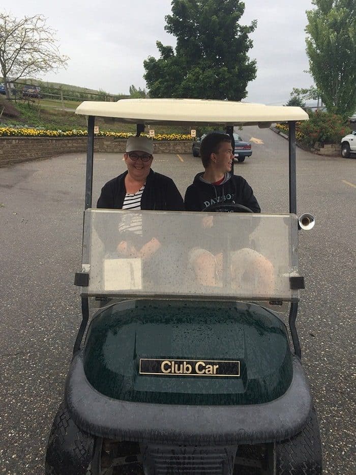 riding in a private golf cart