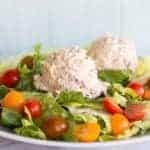 2 scoops of Artichoke Chicken on top of salad mix