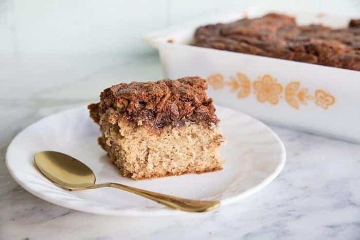 Chocolate Peanut Butter Banana Cake in a small white plate and in a baking pan