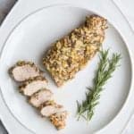 Rosemary Garlic Parmesan Pork Tenderloin in a large white plate