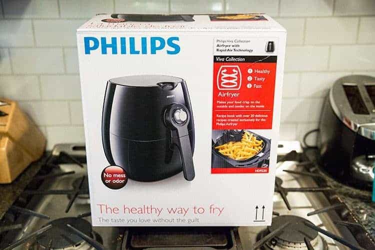 box po Philips brand airfryer on top of stove