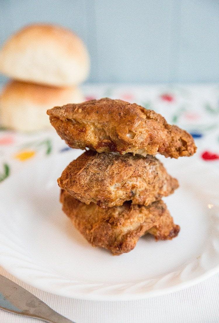 stack of Air Fryer Fried Chicken in white plate