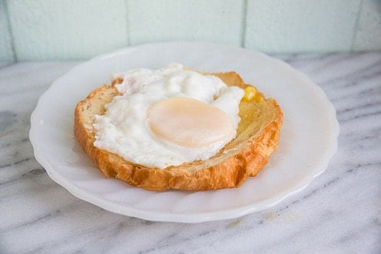 Gordon Ramsey's Airfryer BBQ Glazed Bacon & Eggs Croissants in a white plate