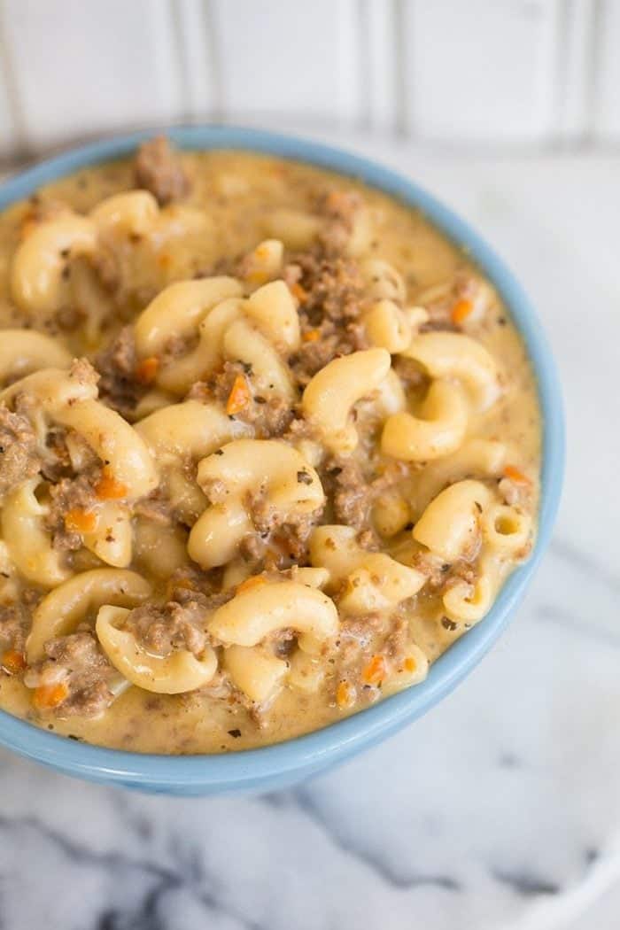 Crockpot Macaroni Cheeseburger Soup in marble background