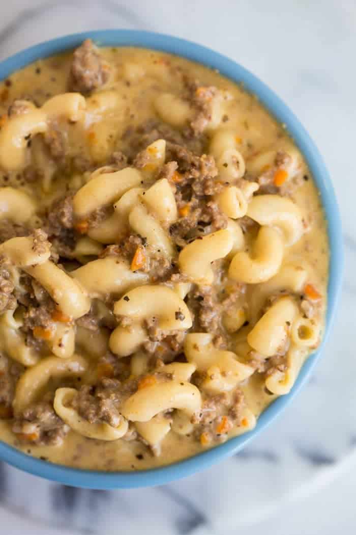 Cheeseburger Soup in a blue soup bowl