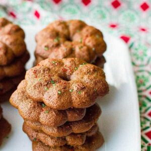close up stacks of Gingersnap Cookies in a white plate