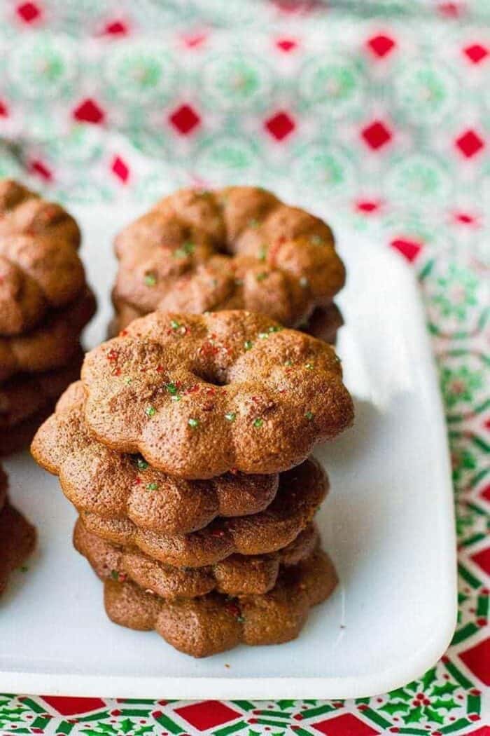 close up stacks of Gingersnap Cookies in a white plate