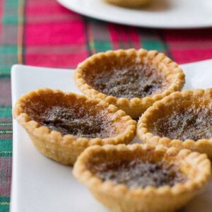 freshly baked Classic Canadian Butter Tarts in a white plate