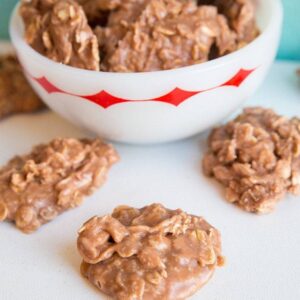 Close up of Chocolate Peanut Butter Oatmeal Cookies in a bowl and around it