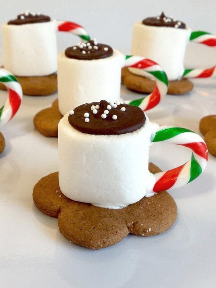 cookies that looks like cup of cocoa on top of a gingersnap cookies