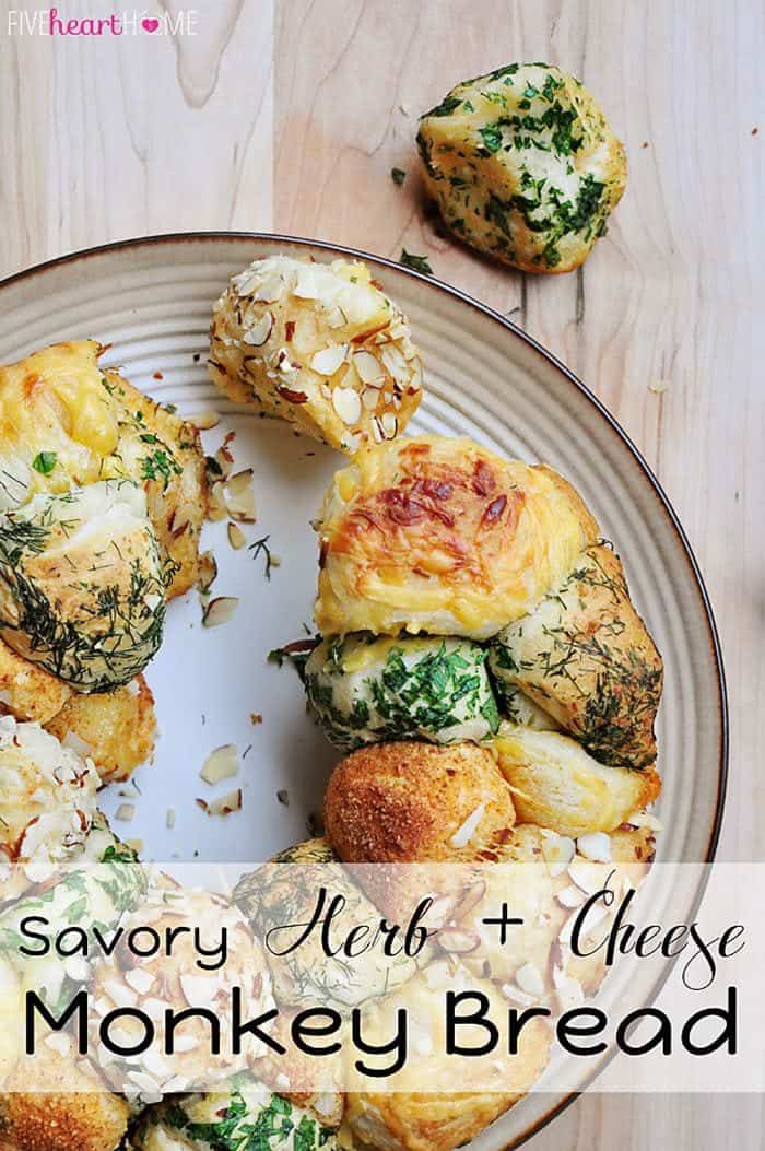 Savoury Herb & Cheese Monkey Bread in a round white plate