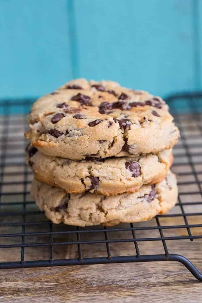 Stack of Thick and Chewy Peanut Butter Chocolate Chip Cookies in Black cooling rack