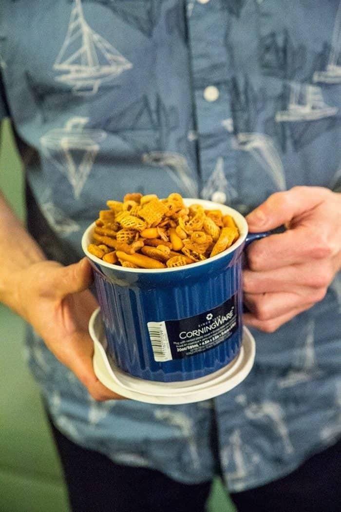 Phil from Baconhound holding a blue CorningWare Meal Mug with Homemade Nuts & Bolts