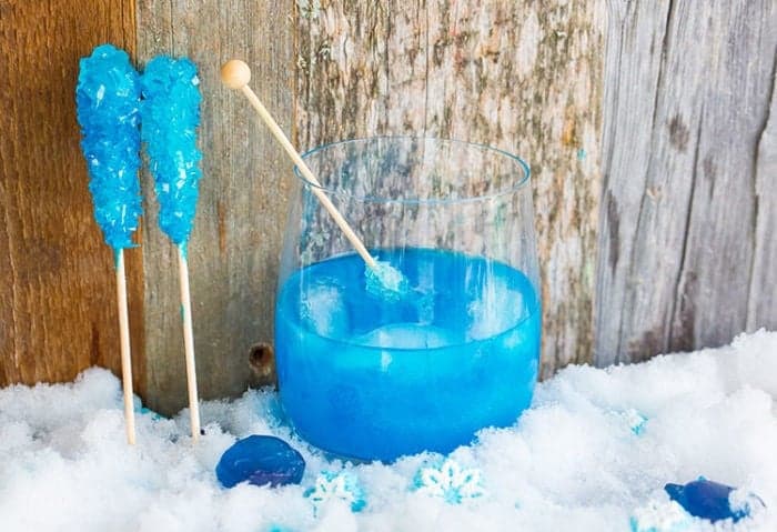 a glass of Swedish Polar Bear Cocktail garnish with snowflakes