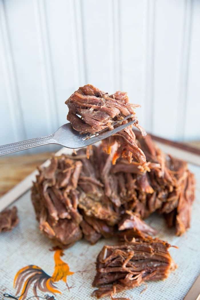 Cooking a Roast in an Instant Pot, shredded beef in a fork