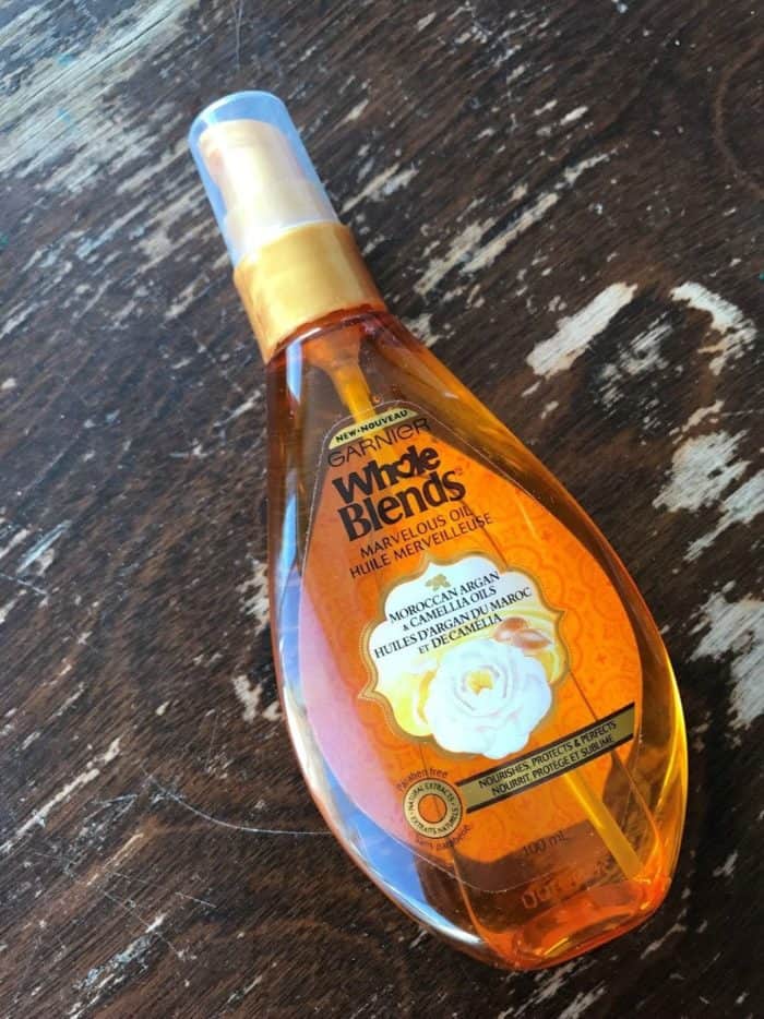Garnier Whole Blends Moroccan Argan & Camellia Oils blend in a spray bottle