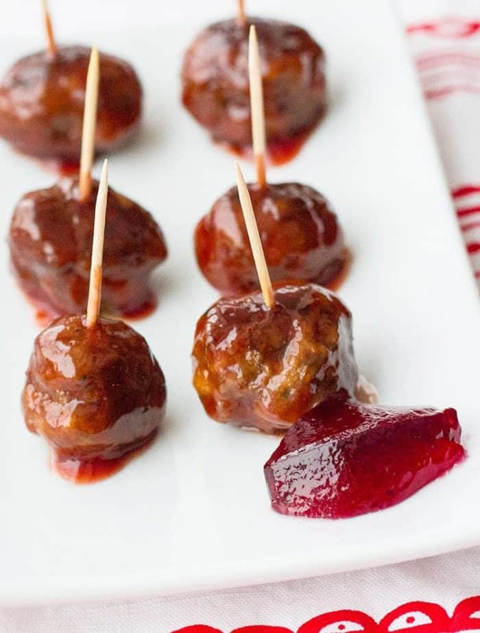 Grape jelly meatballs with toothpicks to serve