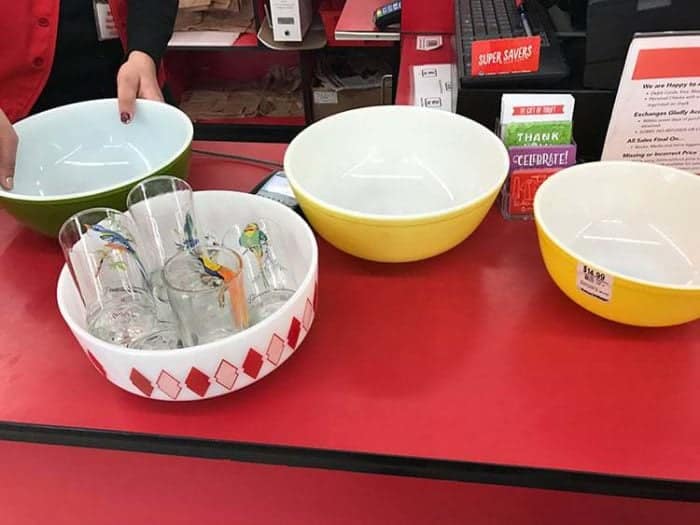 Pyrex yellow primary and Federal Glass Red Diamonds bowl on red table