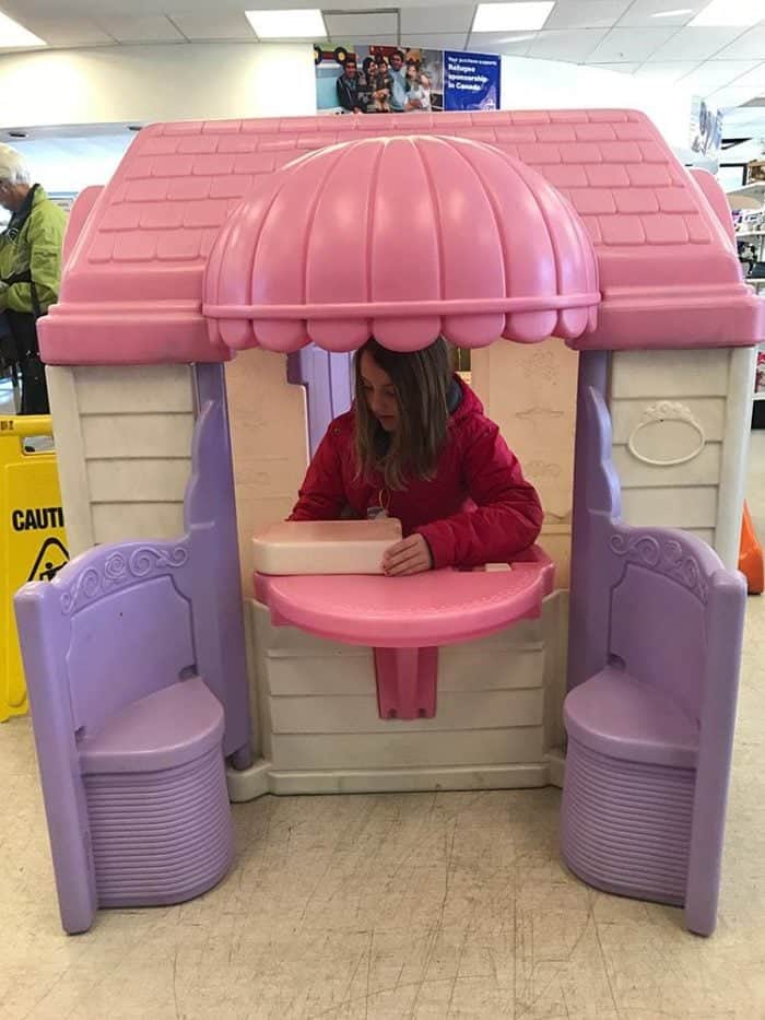 pink, cream and violet colored playhouse