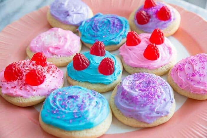 a plate of colorful Old Fashioned Cut-Out Sour Cream Sugar Cookies
