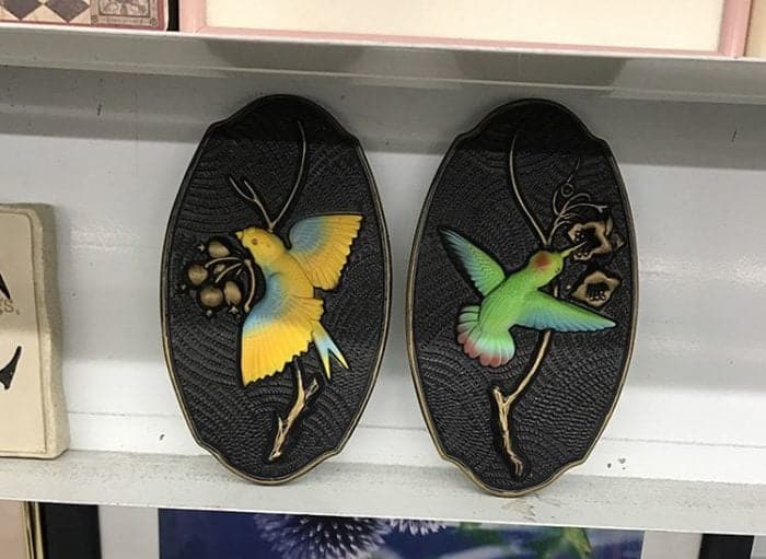 Bird chalkware plaques with yellow and green color of birds