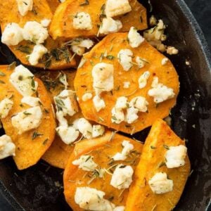 Sweet Potatoes with Herbed Feta cheese, thyme and rosemary in a Large Bowl