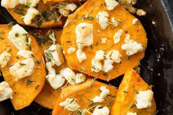 Sweet Potatoes with Herbed Feta cheese, thyme and rosemary in a Large Bowl