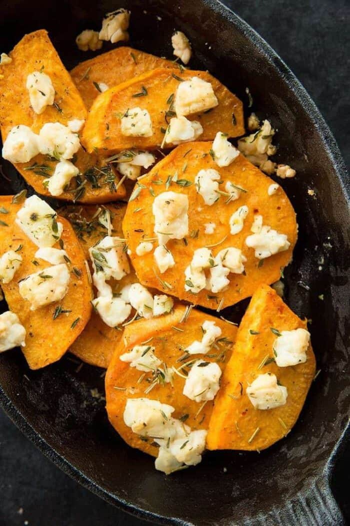 Sweet Potatoes with Herbed Feta cheese, thyme and rosemary in a Large Bowl