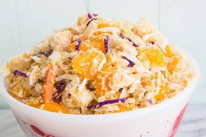 Ginger Citrus Chicken Couscous Coleslaw with sesame dressing on top