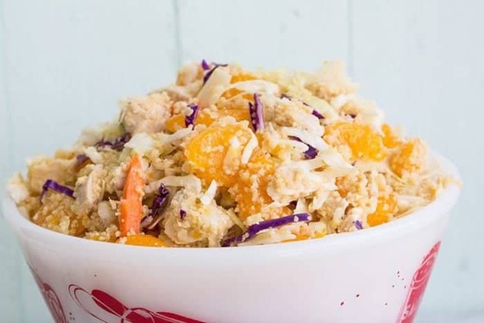 Ginger Citrus Chicken Couscous Coleslaw in a white bowl