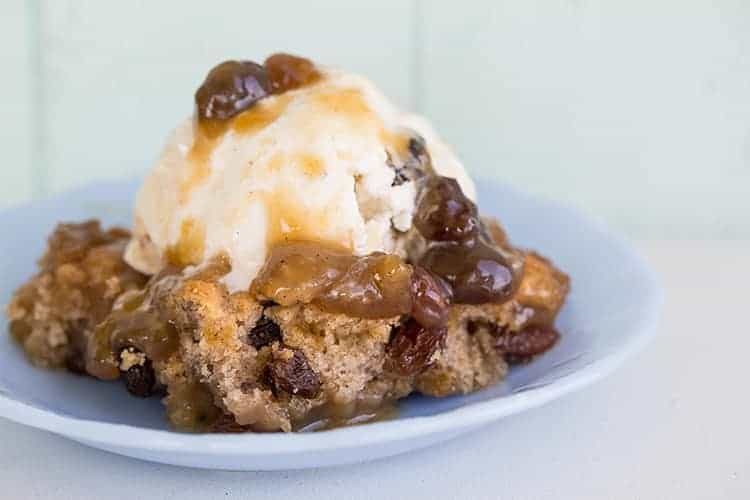 Magic Caramel Pudding Cake in a pale blue dessert plate