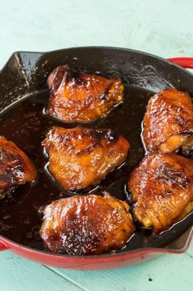 Close up of honey garlic chicken in a cast iron skillet