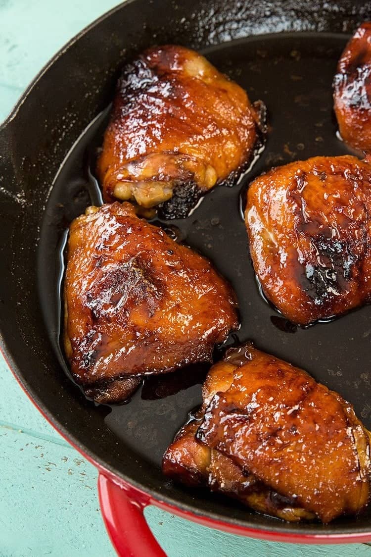 Chicken in a red cast iron skillet