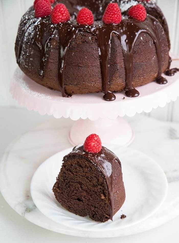 Raspberry Kahlua Mudslide Bundt Cake with Chocolate Glaze and fresh raspberries on top