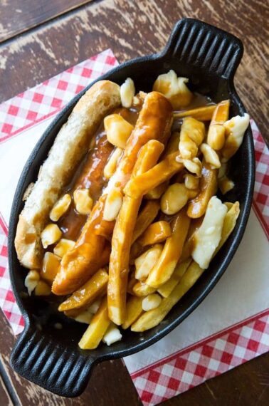 Top down shot of Poutine Hot Dogs with buns
