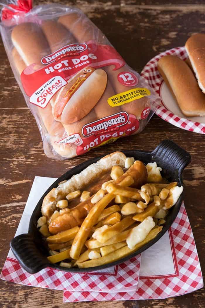 Close up of Poutine Hot Dogs and a pack of Dempster’s hot dog buns