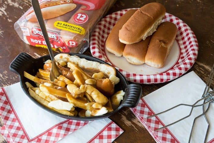 Cooking the Poutine Hot Dogs, Dempster’s hot dog buns on a plate