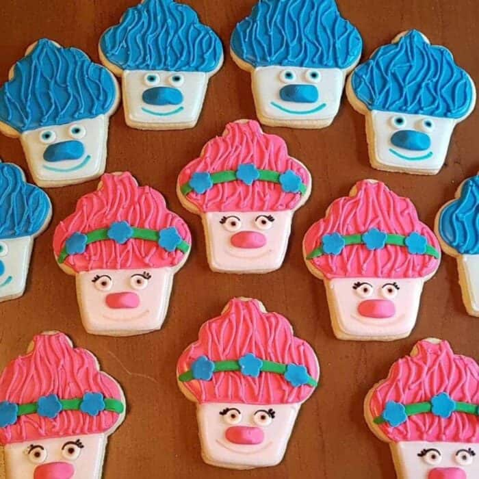 close up of rolled sugar cookies that looks like the popular Trolls character